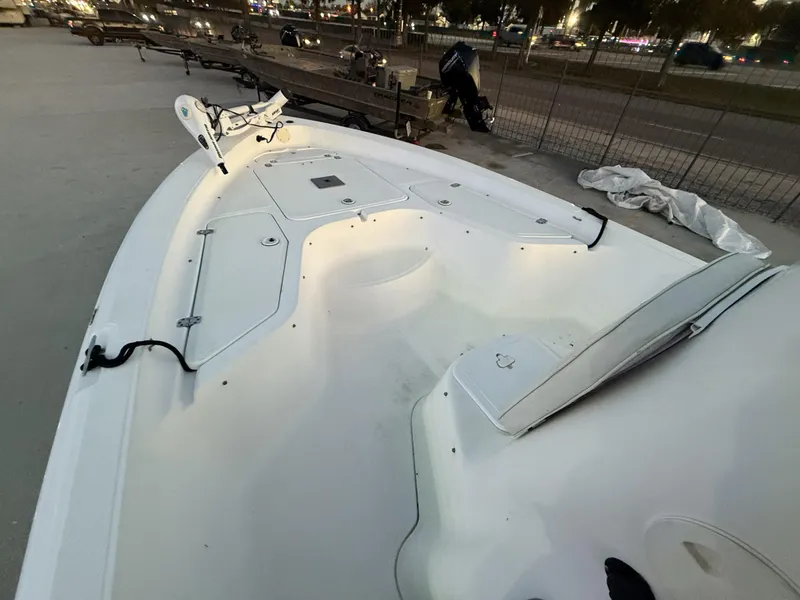 Slide: The Image of 2006 Sea Fox Bay Fisher 225 boat interior with storage compartments and seating. - 6