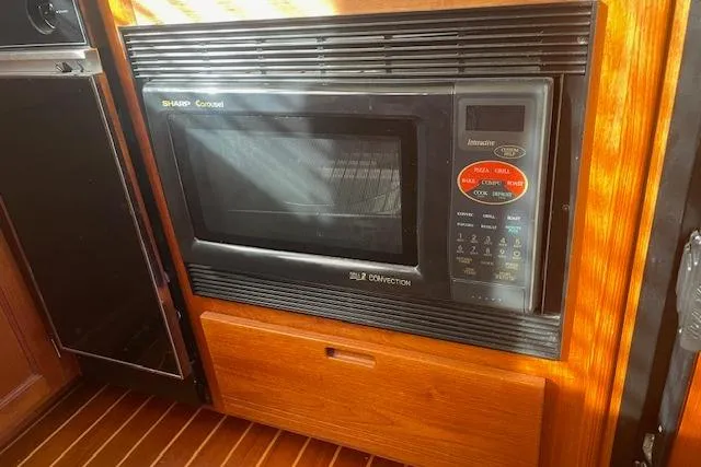 Slide: The Image of Sharp Convection microwave in 2006 Nordic Tug 42 boat interior. - 32