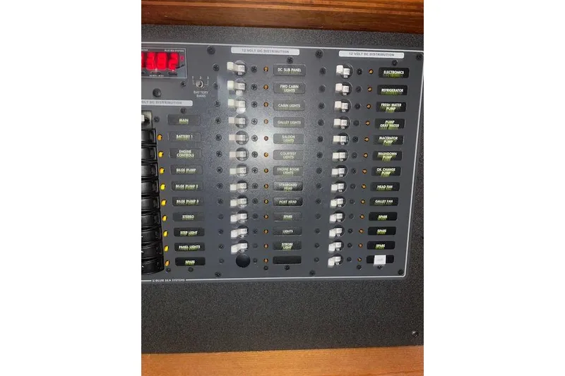 Slide: The Image of Electrical control panel on a 2006 Nordic Tug 42 boat. - 48
