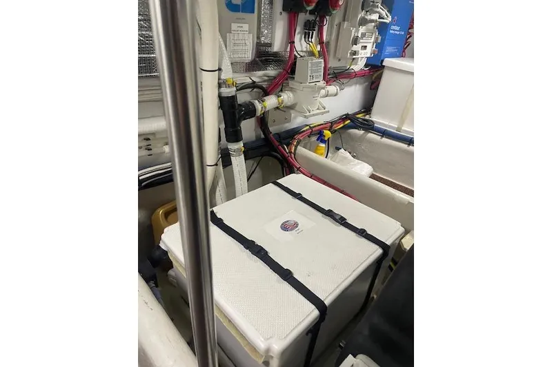 Slide: The Image of Engine room of 2006 Nordic Tug 42 with equipment and wiring. - 61