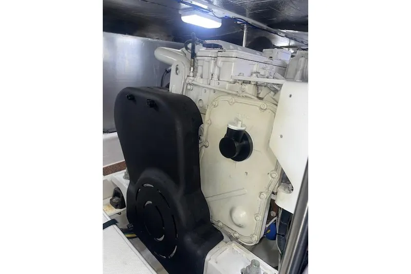 Slide: The Image of Engine compartment of a 2006 Nordic Tug 42, showcasing mechanical components. - 63