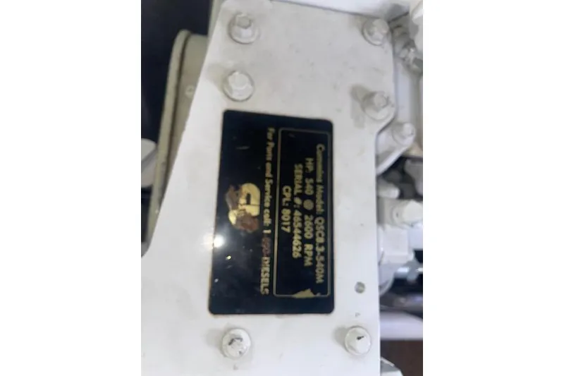 Slide: The Image of Engine label on 2006 Nordic Tug 42, displaying model and specifications. - 65