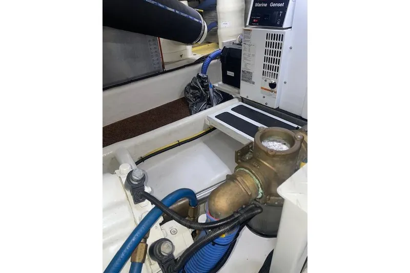 Slide: The Image of Engine room of 2006 Nordic Tug 42 with marine generator and piping. - 67