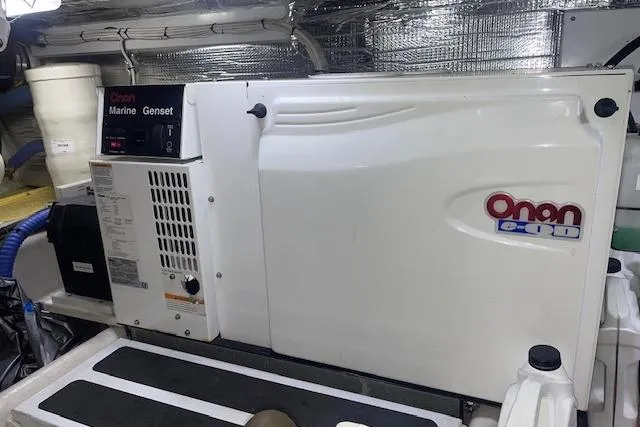 Slide: The Image of Onan marine generator in a 2006 Nordic Tug 42 engine room. - 68