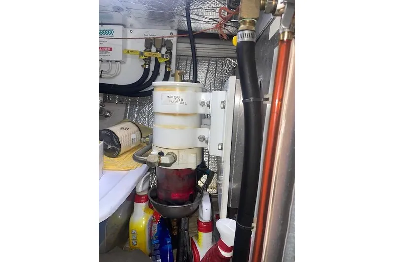 Slide: The Image of Engine room of 2006 Nordic Tug 42 with fuel filter and maintenance supplies. - 71