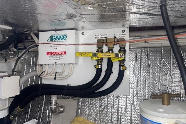 Slide: The Image of Engine room of 2006 Nordic Tug 42 with fuel polisher system and insulated walls. - 72