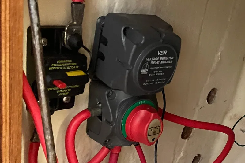 Slide: The Image of Voltage sensitive relay module with red cables, PCI 105 MC, 2009 model. - 16