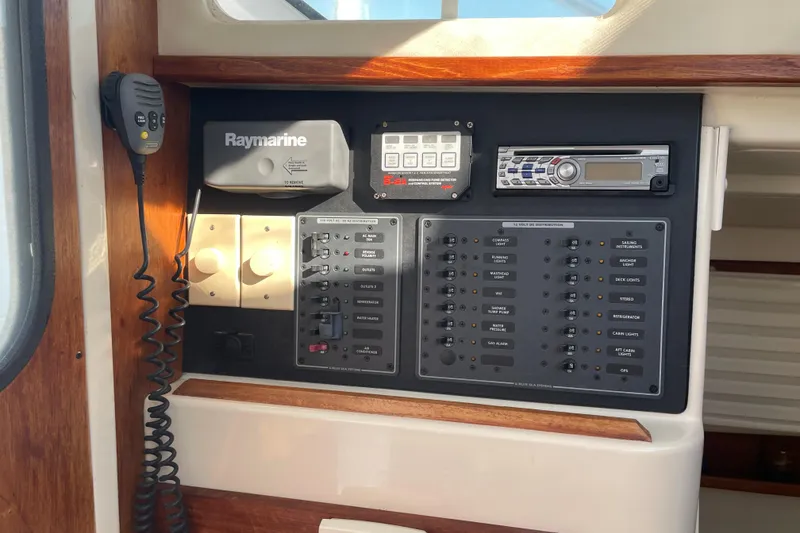 Slide: The Image of Control panel of a 2009 PCI 105 MC boat with navigation and communication equipment. - 17