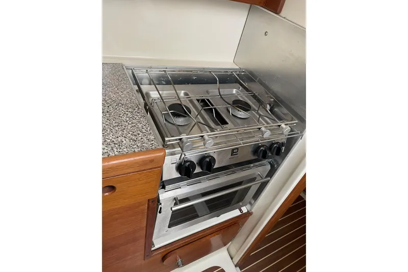 Slide: The Image of Compact PCI 105 MC stove and oven in a wooden kitchen, 2009 model. - 18