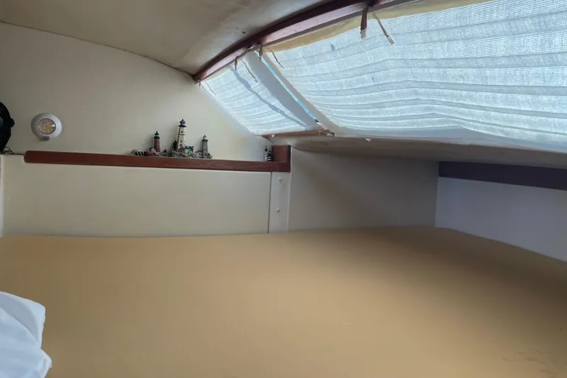 Slide: The Image of Cozy cabin interior of 2009 PCI 105 MC boat with decorative lighthouses. - 22