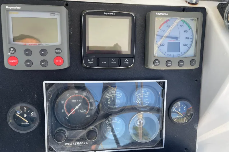 Slide: The Image of Boat control panel with Raymarine displays and Westerbeke gauges, PCI 105 MC, 2009 model. - 28