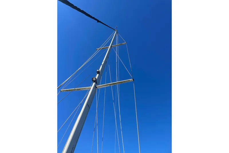 Slide: The Image of Tall sailboat mast against clear blue sky, PCI 105 MC, 2009 model. - 8