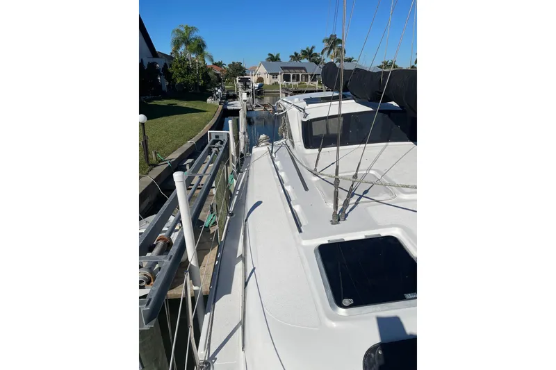 Slide: The Image of Sailboat docked in a canal, PCI 105 MC, 2009 model. - 9