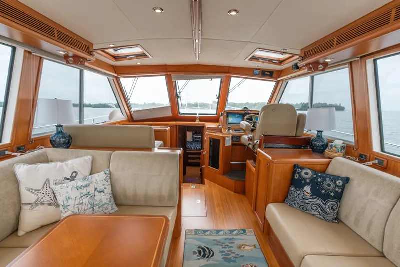 Slide: The Image of Luxurious interior of 2011 Grand Banks 46 Eastbay SX yacht with elegant seating and helm. - 3