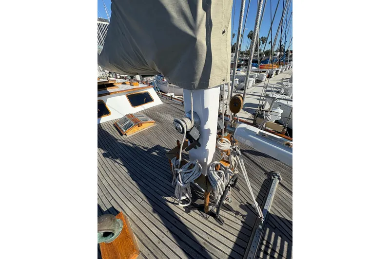 Slide: The Image of Deck of 1979 Formosa 51 sailboat with rigging and wooden details. - 17