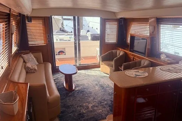 Slide: The Image of Luxurious interior of a 2007 Navigator 58 yacht with elegant furnishings and natural light. - 3