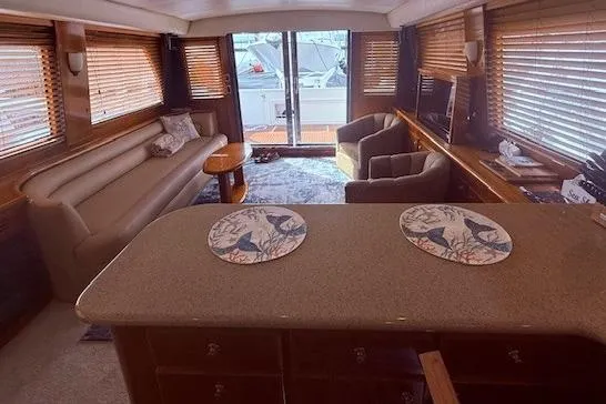Slide: The Image of Luxurious interior of 2007 Navigator 58 yacht with elegant seating and decor. - 5