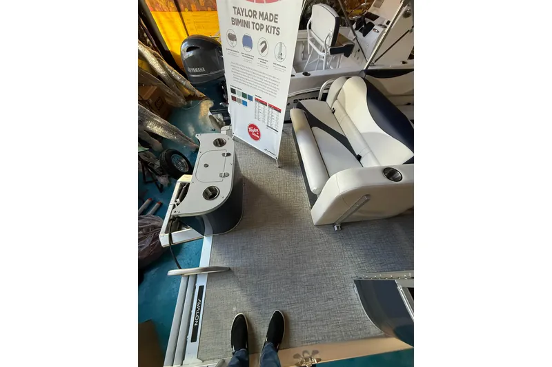 Slide: The Image of 2025 Avalon Venture Cruise Rear Bench with Taylor Made Bimini Top Kits display. - 9