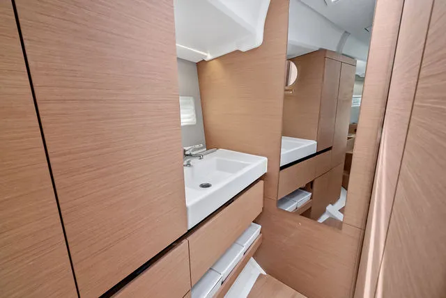 Slide: The Image of 2026 Jeanneau NC 1095 Fly Series 2 boat, sleek design, white exterior, spacious deck. - 45