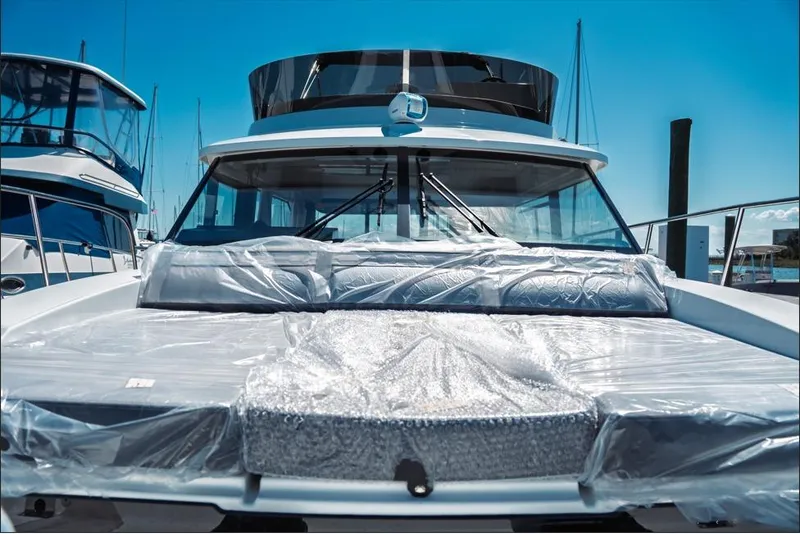 Slide: The Image of 2026 Jeanneau NC 1095 Fly Series 2 yacht with sleek flybridge and modern design. - 46