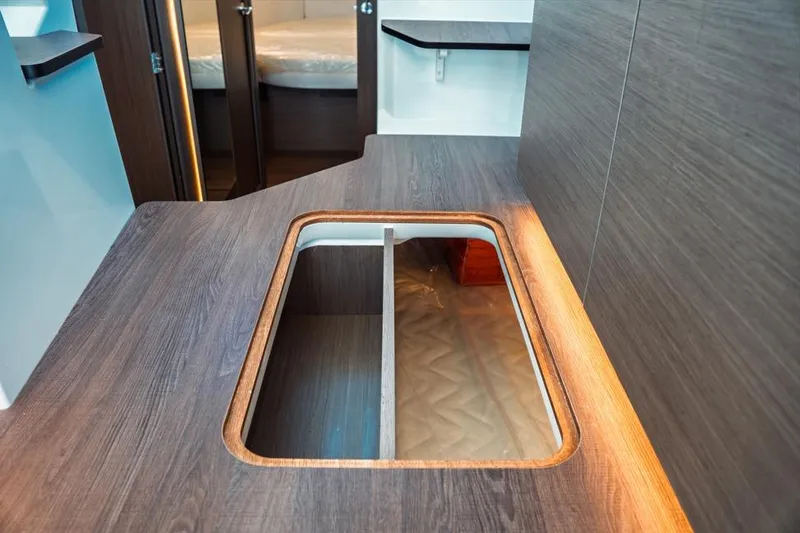 Slide: The Image of 2026 Jeanneau NC 1095 Fly Series 2 yacht, showcasing sleek design and modern features. - 55