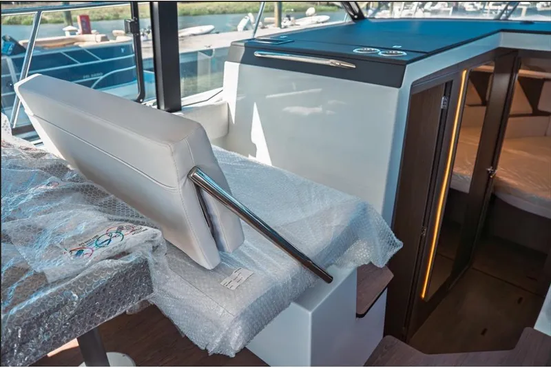 Slide: The Image of Control panel of 2026 Jeanneau NC 1095 Fly Series 2 boat, featuring digital display. - 58