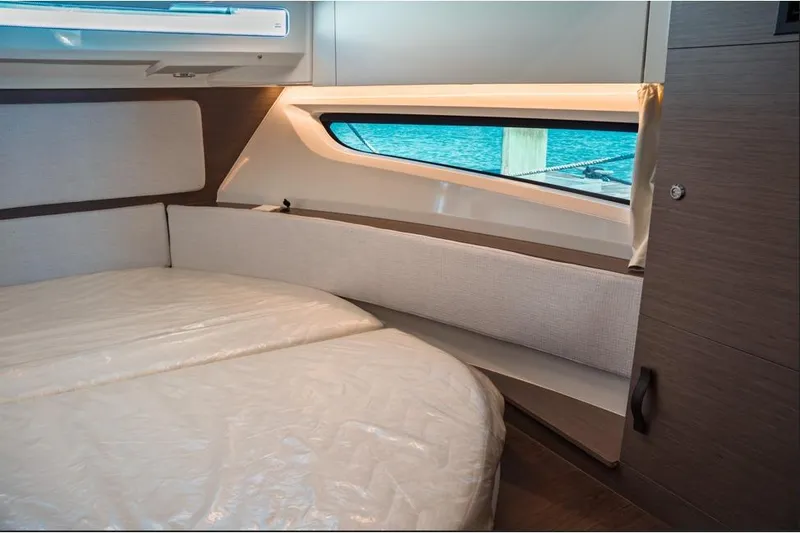 Slide: The Image of Interior cabin of 2026 Jeanneau NC 1095 Fly Series 2, featuring cozy bedding and modern design. - 65