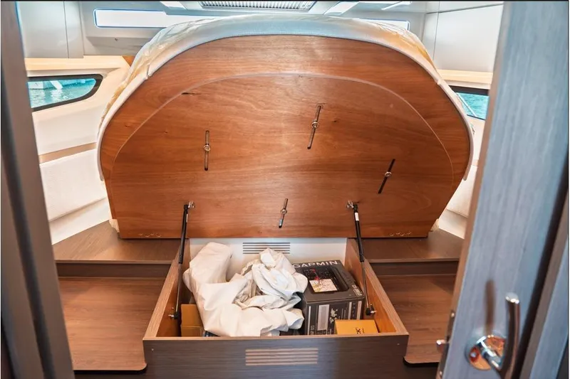 Slide: The Image of Interior of 2026 Jeanneau NC 1095 Fly Series 2, featuring cozy seating and modern decor. - 66