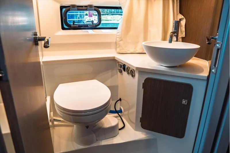 Slide: The Image of Interior of 2026 Jeanneau NC 1095 Fly Series 2 yacht with dining area and ocean view. - 69