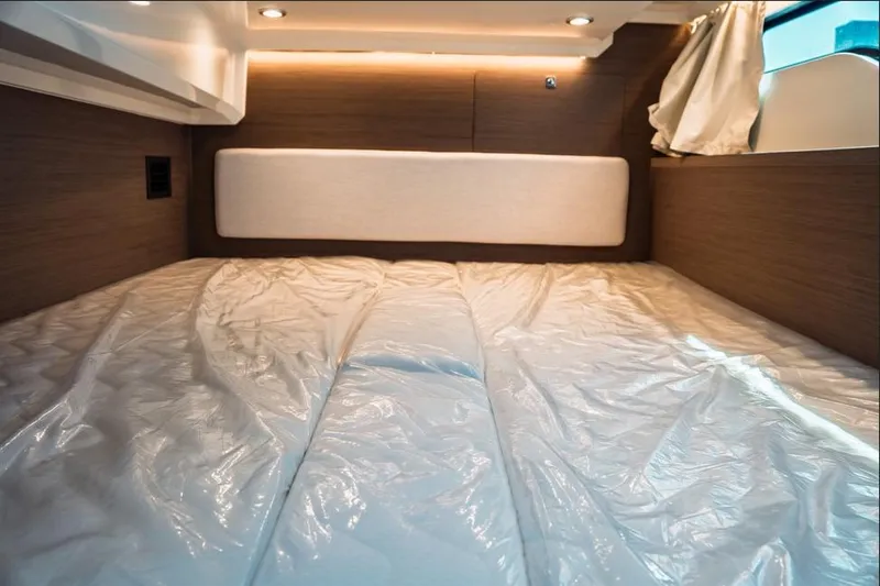 Slide: The Image of 2026 Jeanneau NC 1095 Fly Series 2 interior layout with cabins and bathroom. - 74