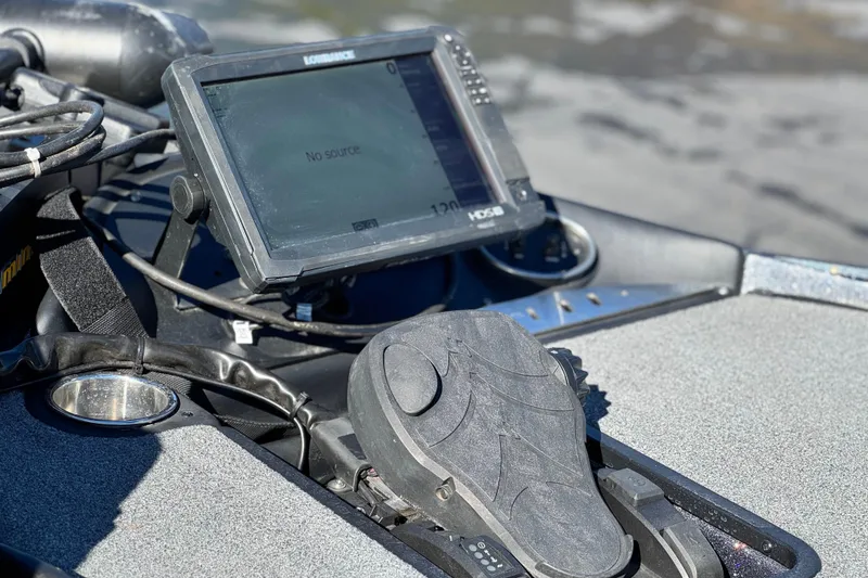 Slide: The Image of 2018 Triton 19 TrX Patriot boat dashboard with Lowrance fishfinder and foot pedal. - 12