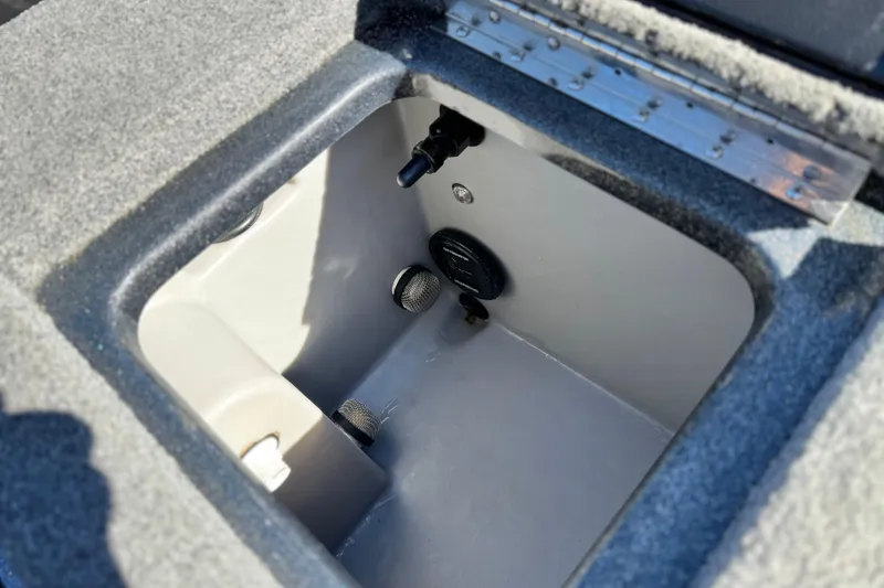 Slide: The Image of 2018 Triton 19 TrX Patriot livewell interior with plumbing and aeration system. - 21