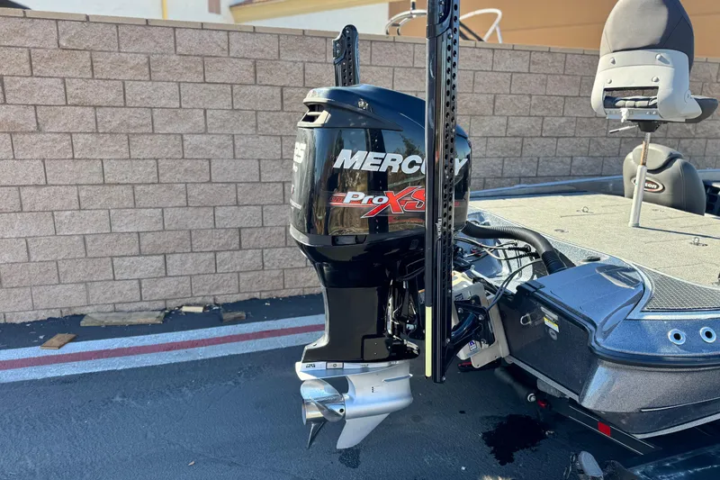 Slide: The Image of 2018 Triton 19 TrX Patriot boat with Mercury Pro XS outboard motor. - 6