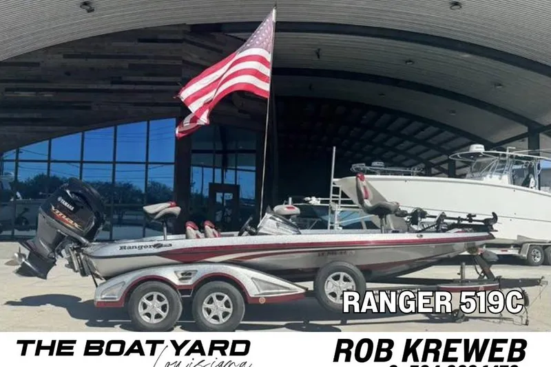The Image of 2015 Ranger Z519C boat with American flag, displayed at The Boat Yard. - 0