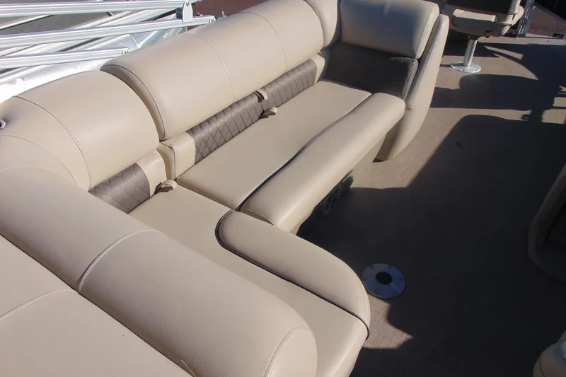 Slide: The Image of 2024 Sun Tracker Fishin' Barge 20 DLX, beige seating area, spacious and comfortable design. - 16