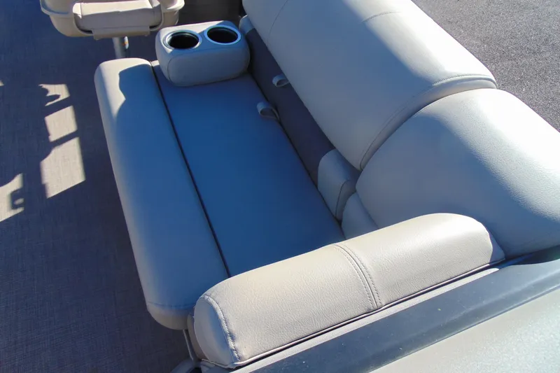 Slide: The Image of 2024 Sun Tracker Fishin' Barge 20 DLX boat seating with cup holders. - 20