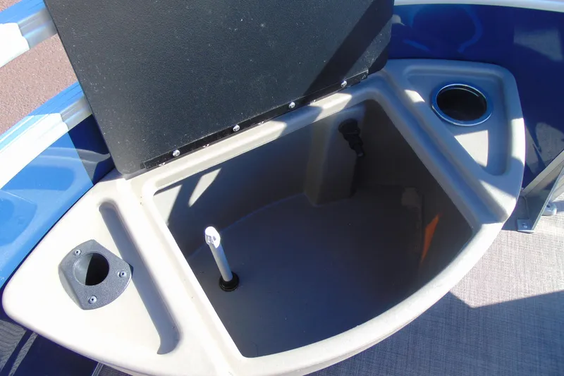 Slide: The Image of 2024 Sun Tracker Fishin' Barge 20 DLX livewell with cup holder and storage compartment. - 26