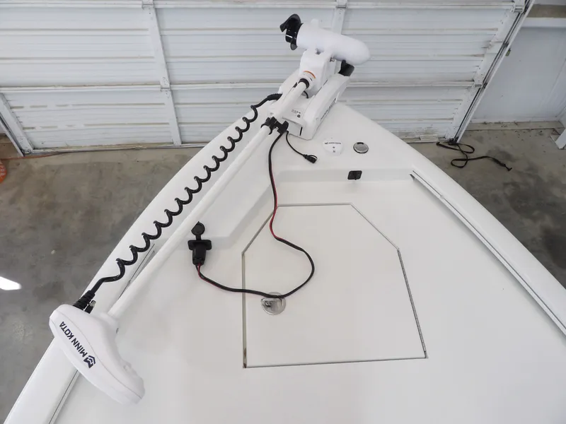 Slide: The Image of Bow of 2026 Avid 21FST boat with Minn Kota trolling motor. - 13