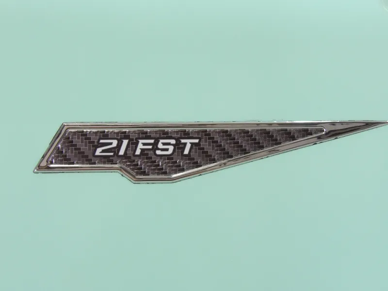 Slide: The Image of 2026 Avid 21FST emblem on light green background, featuring sleek design. - 7