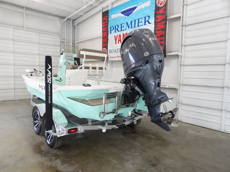 Slide: The Image of 2026 Avid 21FST boat with Yamaha motor in showroom. - 8