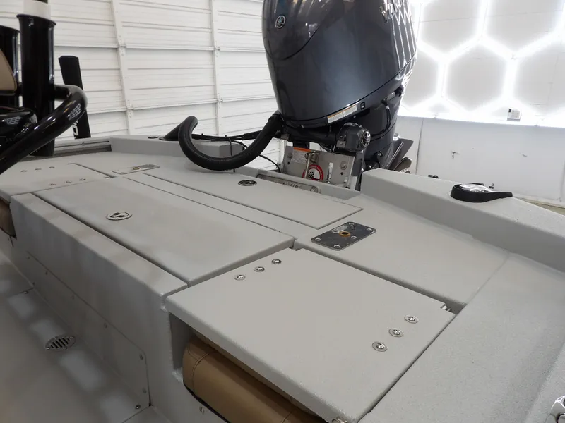 Slide: The Image of Avid 21FST 2026 boat interior with motor, showcasing sleek design and functionality. - 16