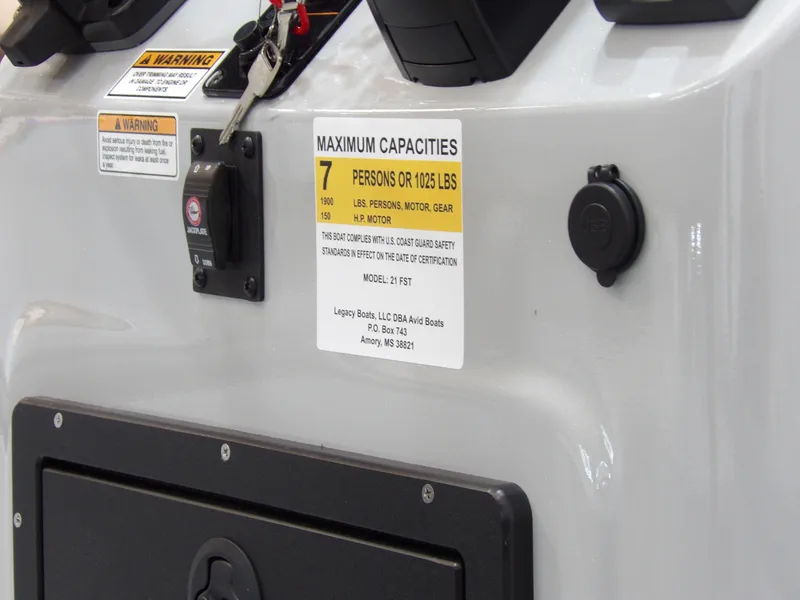 Slide: The Image of 2026 Avid 21FST boat capacity label, showing maximum 7 persons or 1025 lbs. - 22