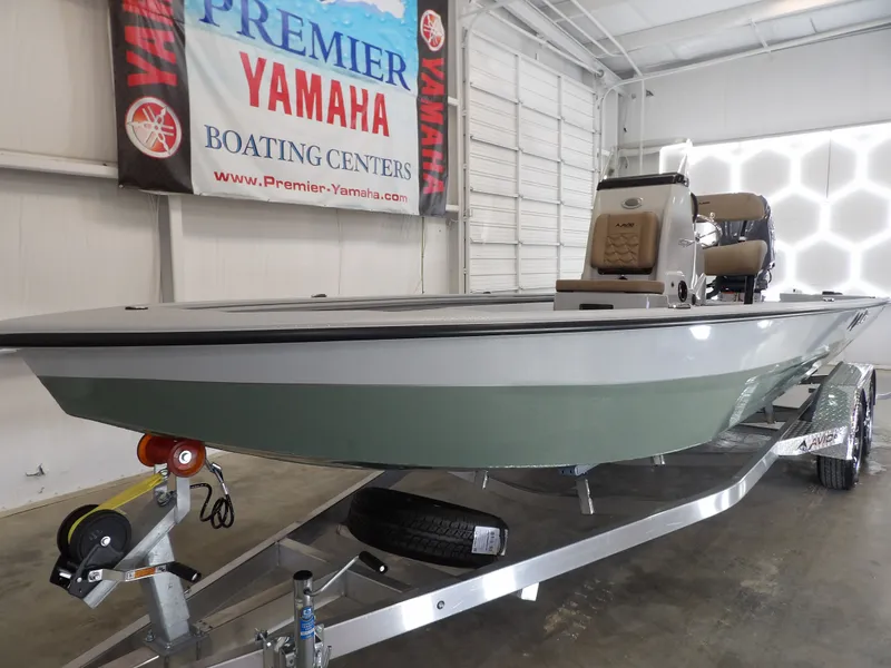 Slide: The Image of 2026 Avid 21FST boat on trailer at Premier Yamaha Boating Center. - 3