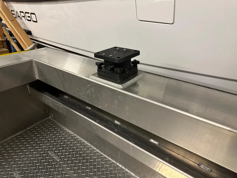 Slide: The Image of Aluminum boat deck with mounting bracket, Northshore 24, 2025 model. - 11