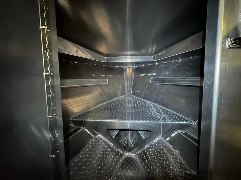 Slide: The Image of Interior view of a 2025 Northshore 24, featuring a sleek, metallic storage compartment. - 25