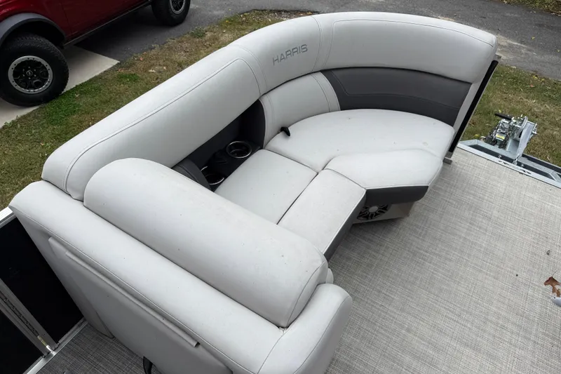 Slide: The Image of Luxurious seating on 2021 Harris Cruiser 210 pontoon boat, featuring plush upholstery. - 15