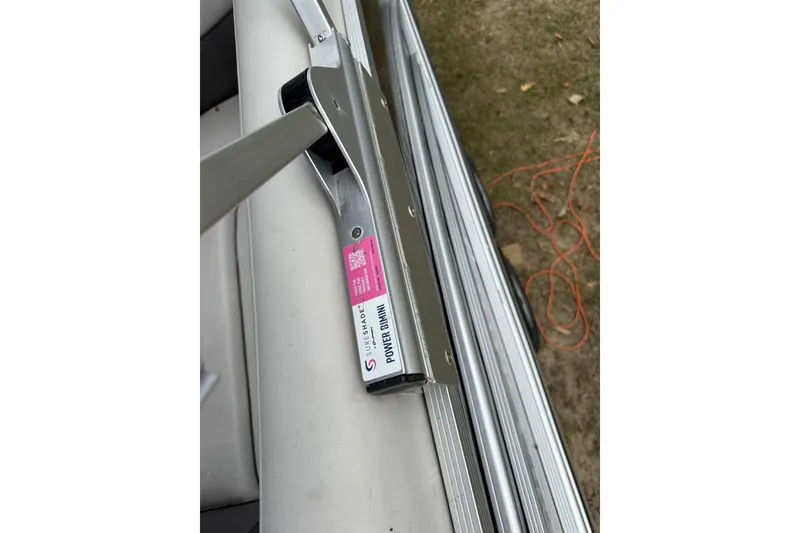 Slide: The Image of 2021 Harris Cruiser 210 boat with SureShade Power Bimini mechanism. - 17