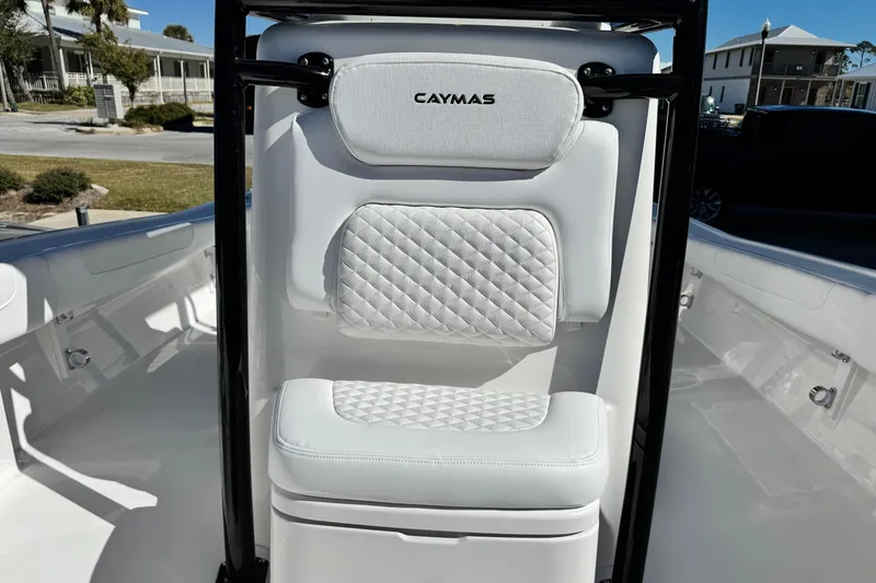 Slide: The Image of 2026 Caymas 28 HB boat seat with quilted white upholstery and black frame. - 19