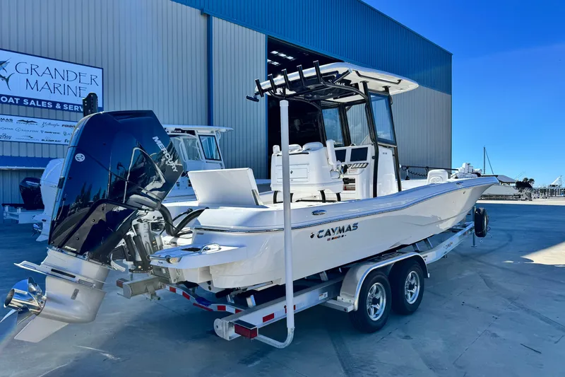 Slide: The Image of 2026 Caymas 28 HB boat on trailer at Grander Marine dealership. - 3