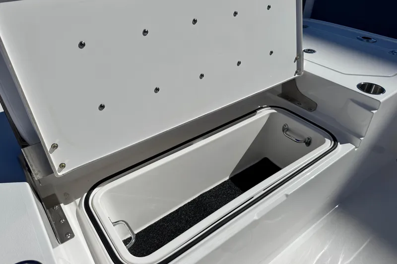 Slide: The Image of Open storage compartment on 2026 Caymas 28 HB boat, showcasing interior space. - 36